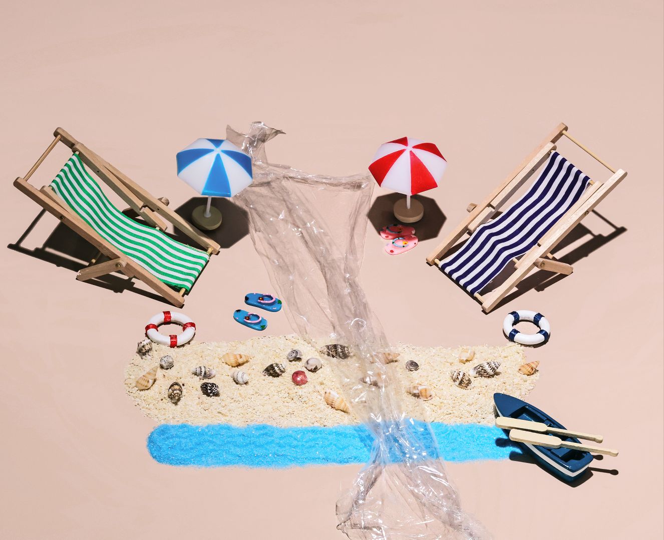 Miniature Beach with single use plastic pollution